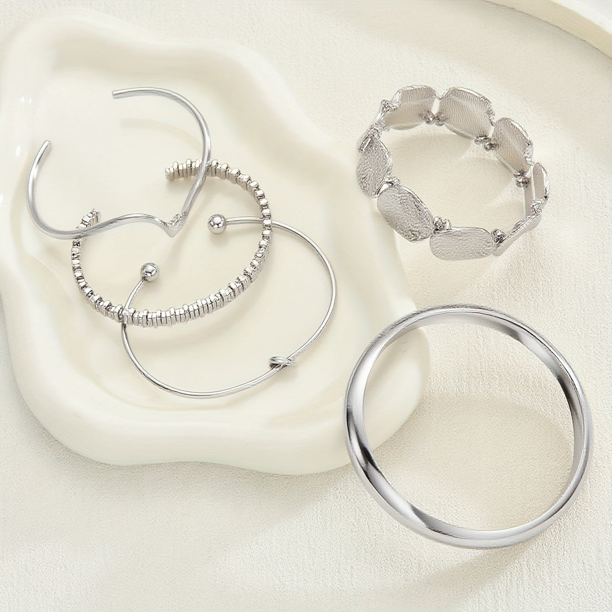 Vintage stapelbare verzilverde set slavenarmbanden