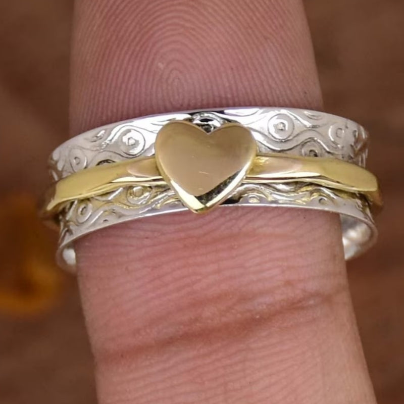 Vintage tweekleurige spinner ring met hartpatroon
