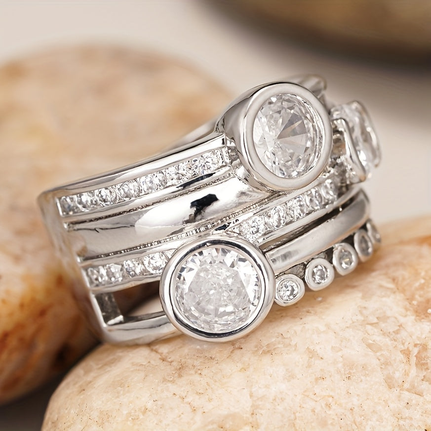 Stijlvolle brede ring met ingelegd zirkonia