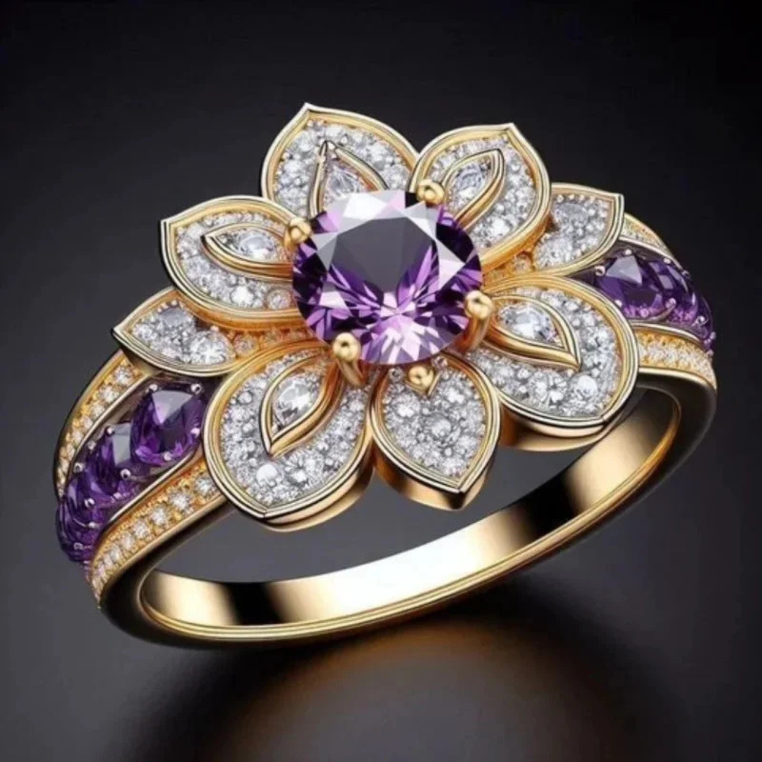 Elegante goudkleurige bloemenring met paars kristal