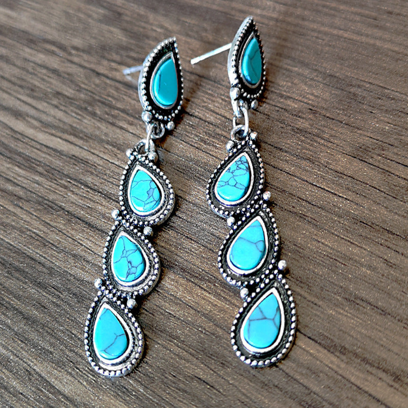 Vintage bladoorhangers met turkoois