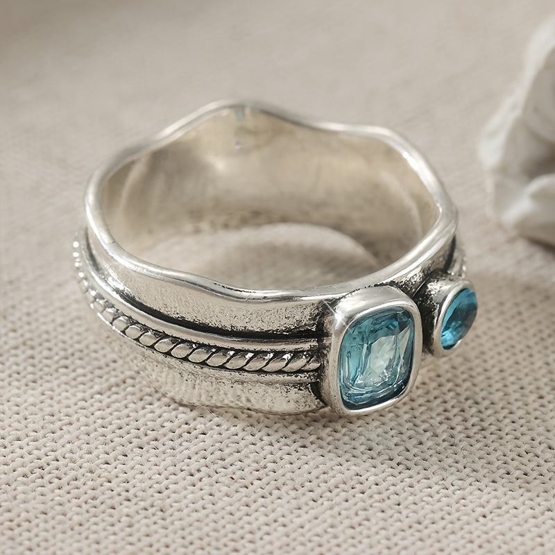 Minimalistische geometrische blauwe zirkonia ring met retro design