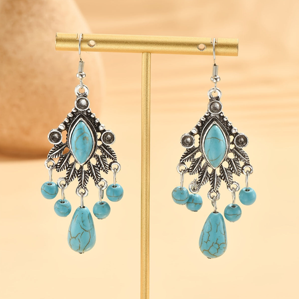 Elegante bohemien oorhangers met turkoois en transparante steen