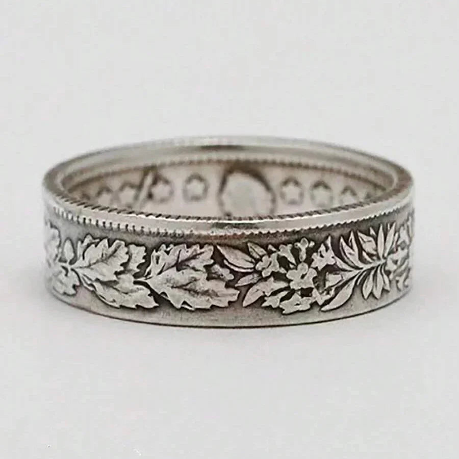 Vintage verzilverde ring met sneeuwvlok- en muntpatroon