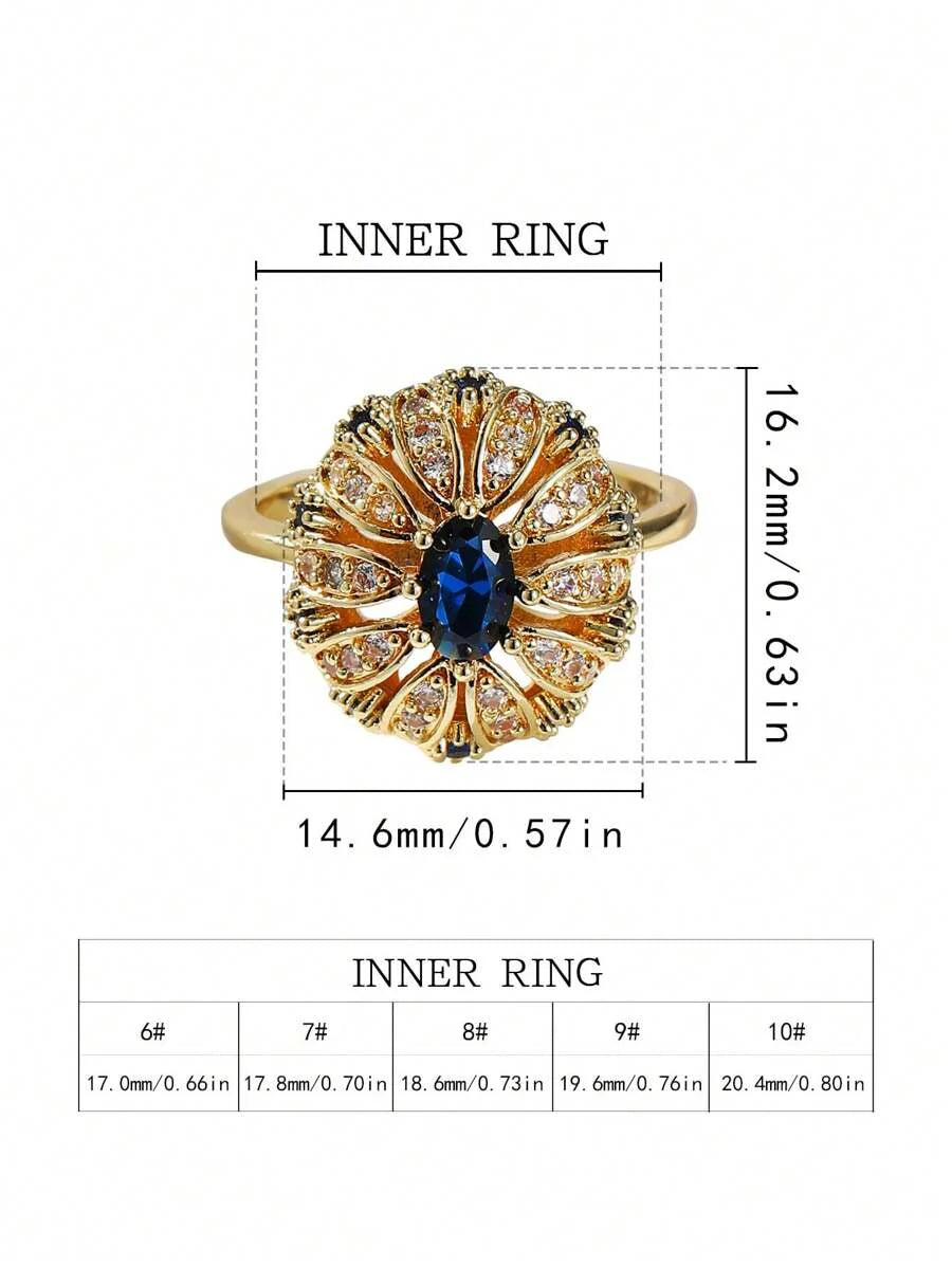 Elegante vergulde ring met zonnebloemontwerp ingelegd met blauwe zirkonia