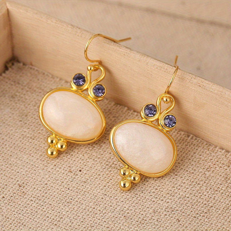 Elegante vergulde ovale retro oorhangers