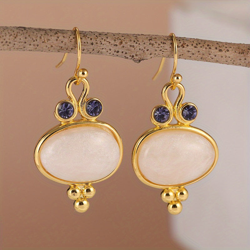 Elegante vergulde ovale retro oorhangers