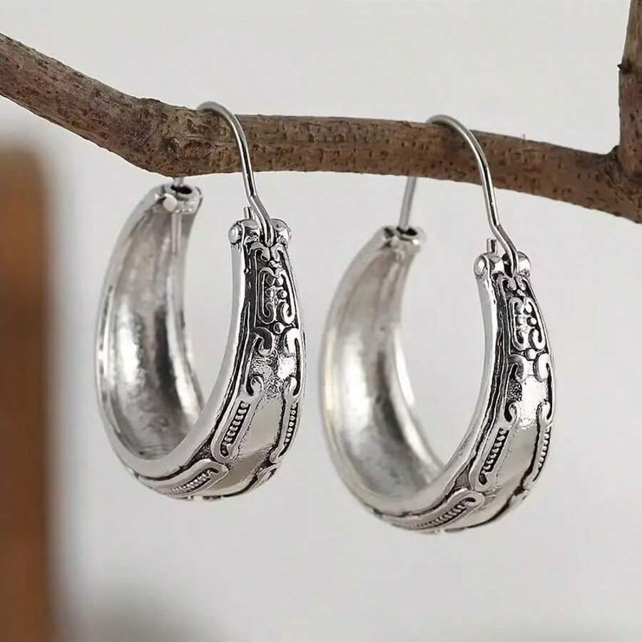 Vintage bohemien oorhangers met gegraveerd bloempatroon