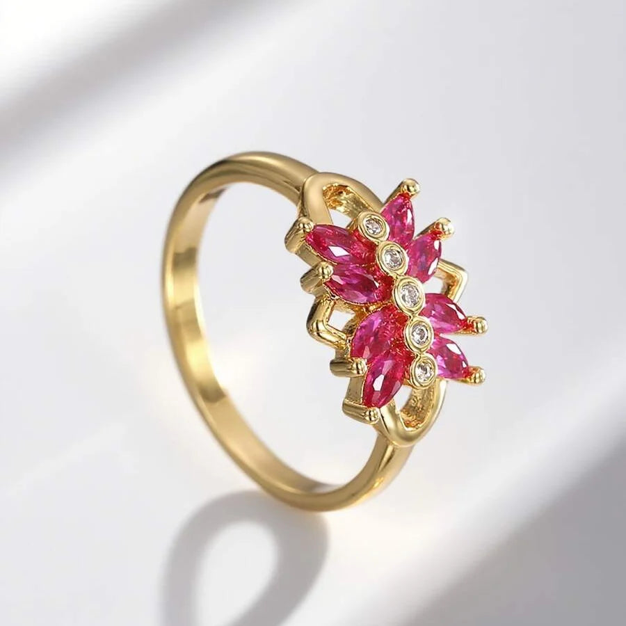 Elegante vintage wikkelring met zirkonia en robijnen bloem