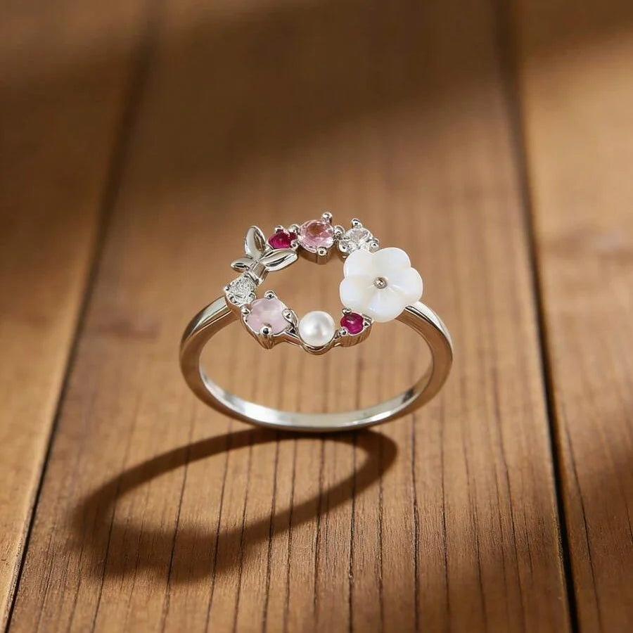 Elegante vlinderring met bloem, imitatieparel en micro-ingelegde zirkonia