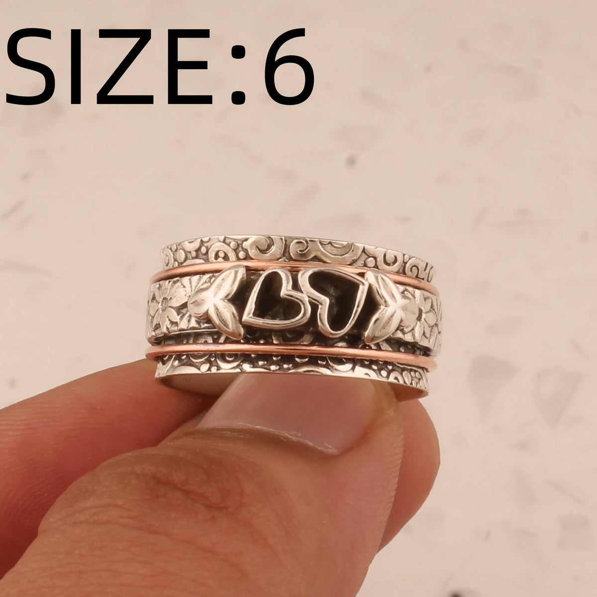 Vintage verzilverde spinner ring met vlinder en hart