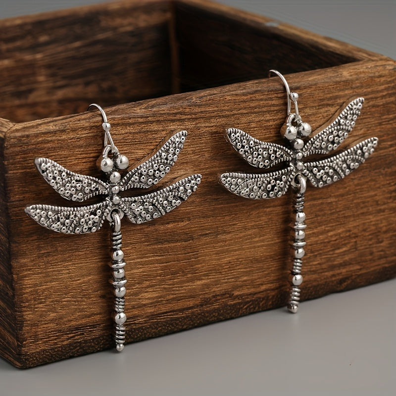 Elegante vintage oorhangers met libelle