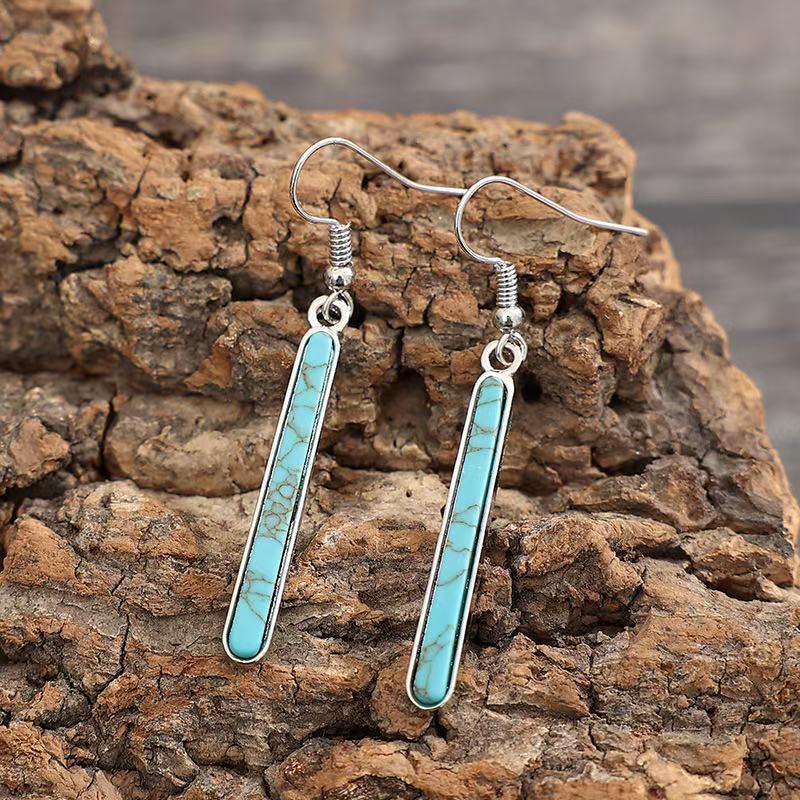 Elegante antiek verzilverde oorhangers met turkoois geometrisch patroon