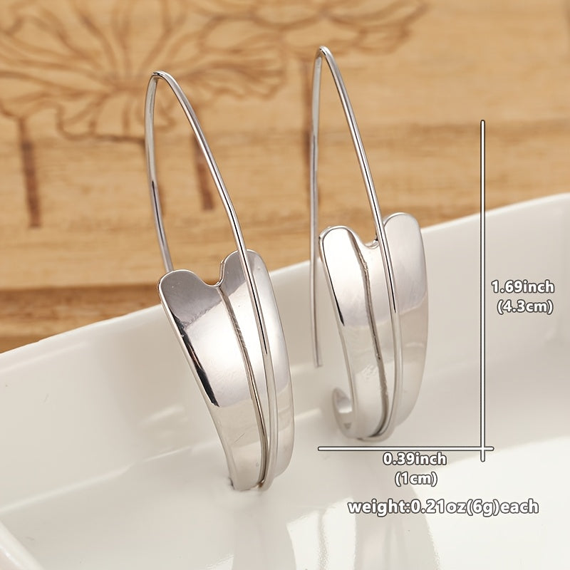 Vintage oorbellen met hartvormig design