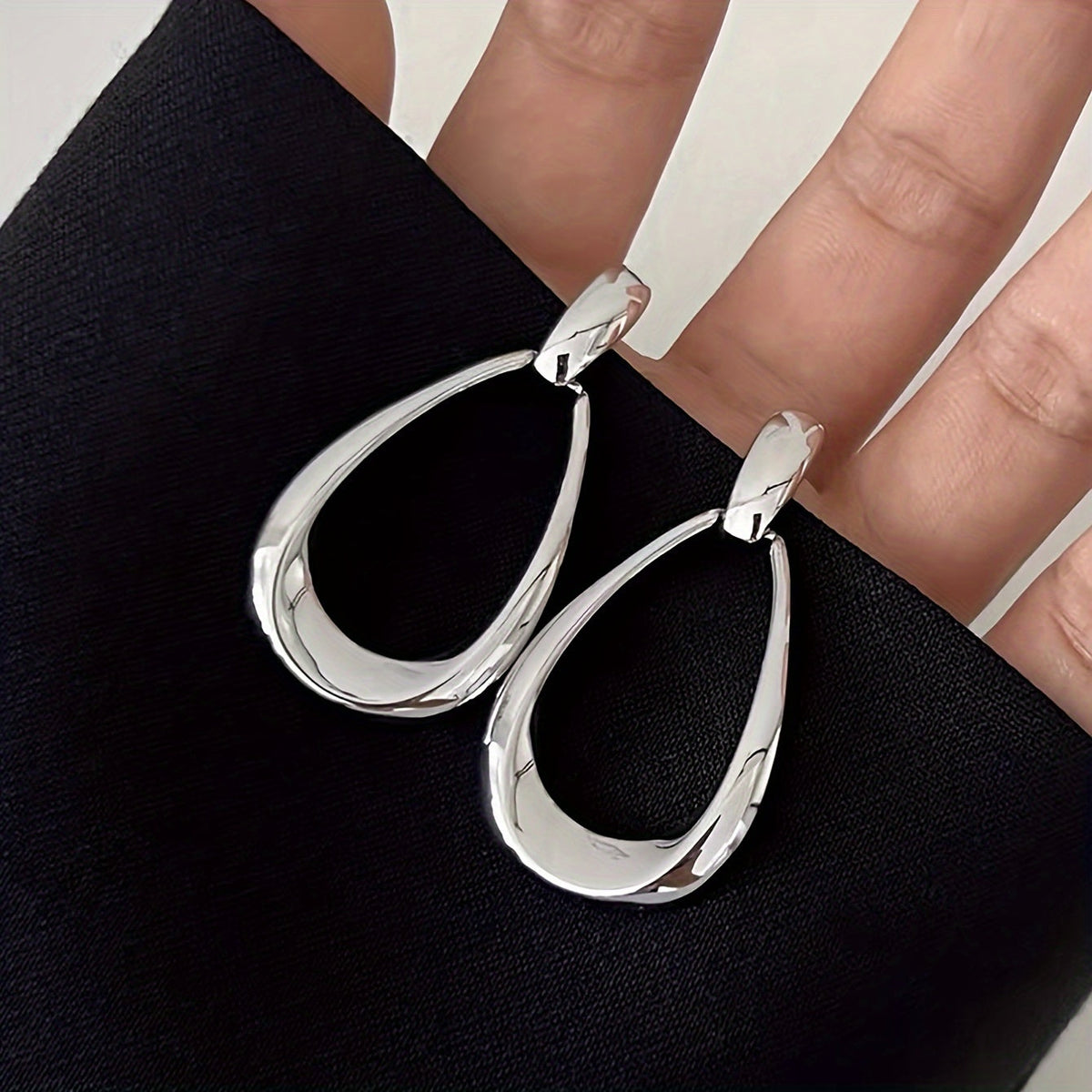 Elegante klassieke gepolijste druppelvormige oorhangers van zinklegering