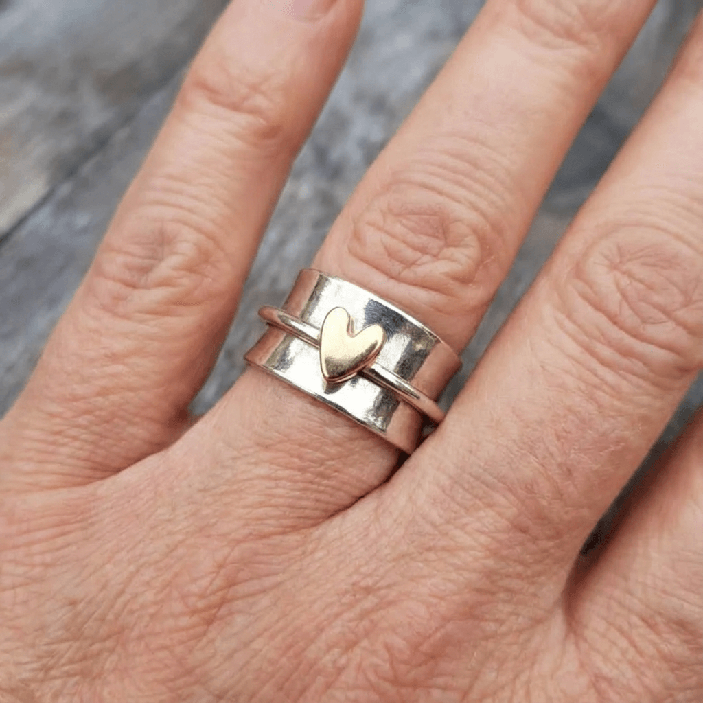 Vintage zilverkleurige ring met goudkleurig hart