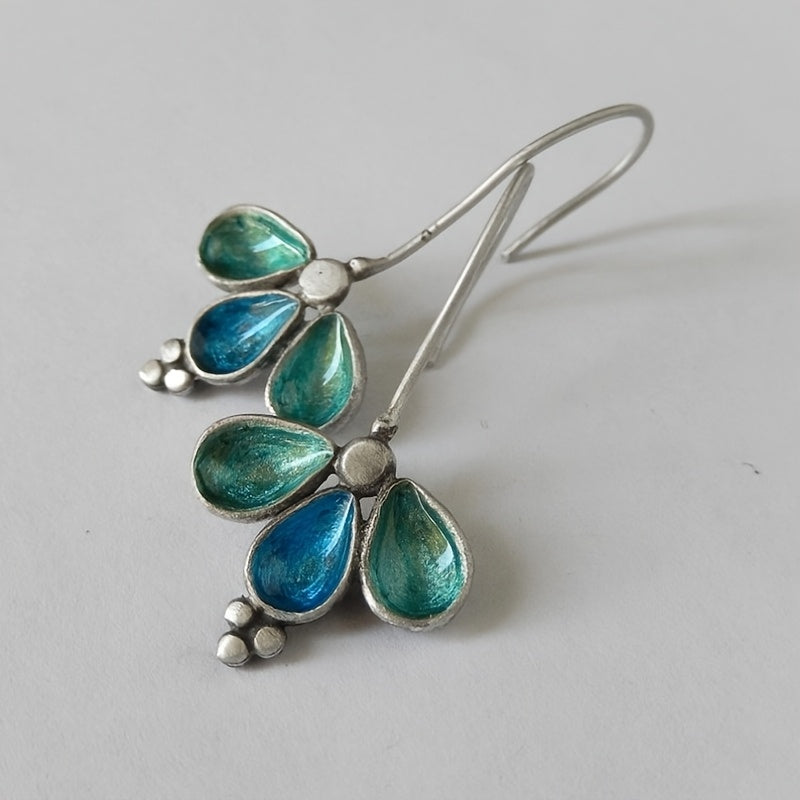 Vintage verzilverde ambachtelijke oorbellen met blauw emaille bloemmotief