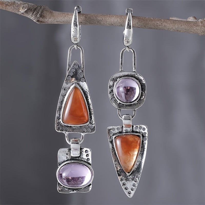 Elegante verzilverde statement oorbellen met strass