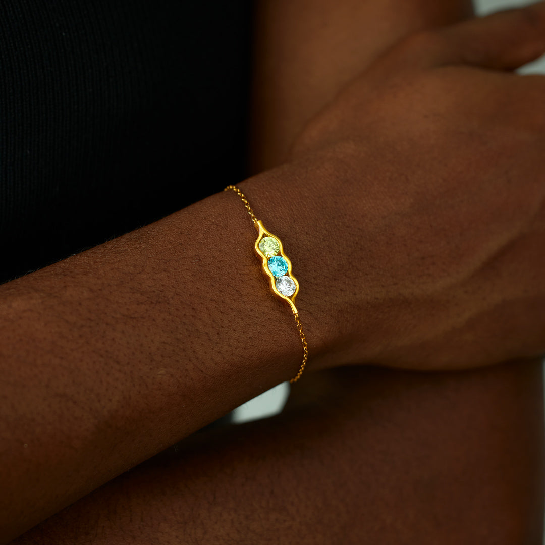 Gepersonaliseerde erwtjes in een peul geboortesteen armband