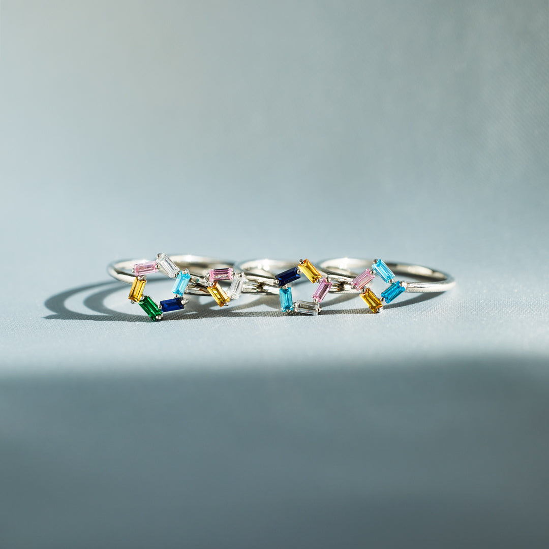 Gepersonaliseerde ring met baguette geboortestenen