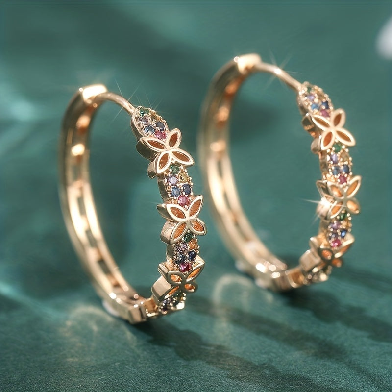 Elegante bohemien oorbellen met meerkleurige zirkonia bloem en vlinder