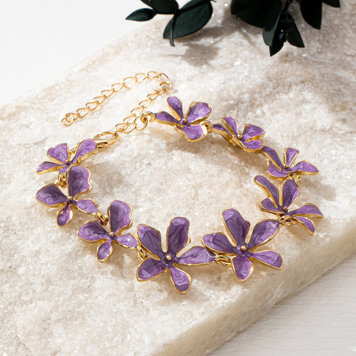 Vintage vergulde armband met paarse emaille bloemen