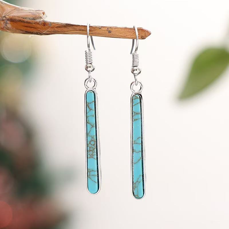 Elegante antiek verzilverde oorhangers met turkoois geometrisch patroon