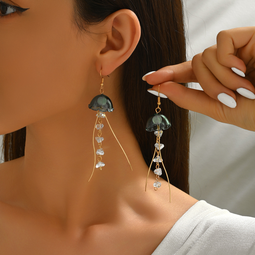Vergulde oorhangers met glazen kwal