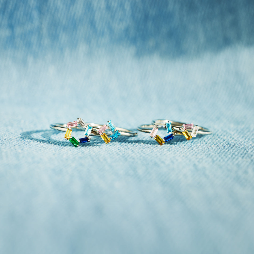 Gepersonaliseerde ring met baguette geboortestenen