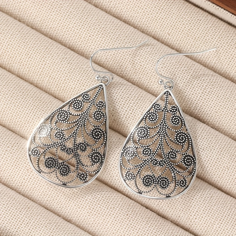 Elegante druppelvormige retro oorbellen met etnische draadprint