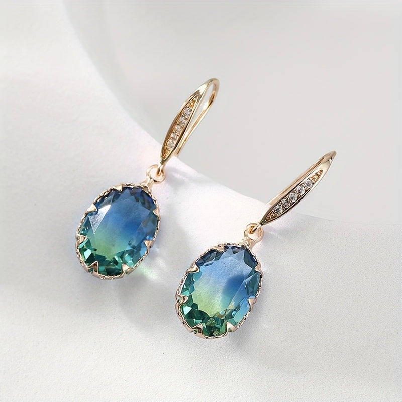 Elegante vintage geïnspireerde oorhangers met ovaal groen kristal
