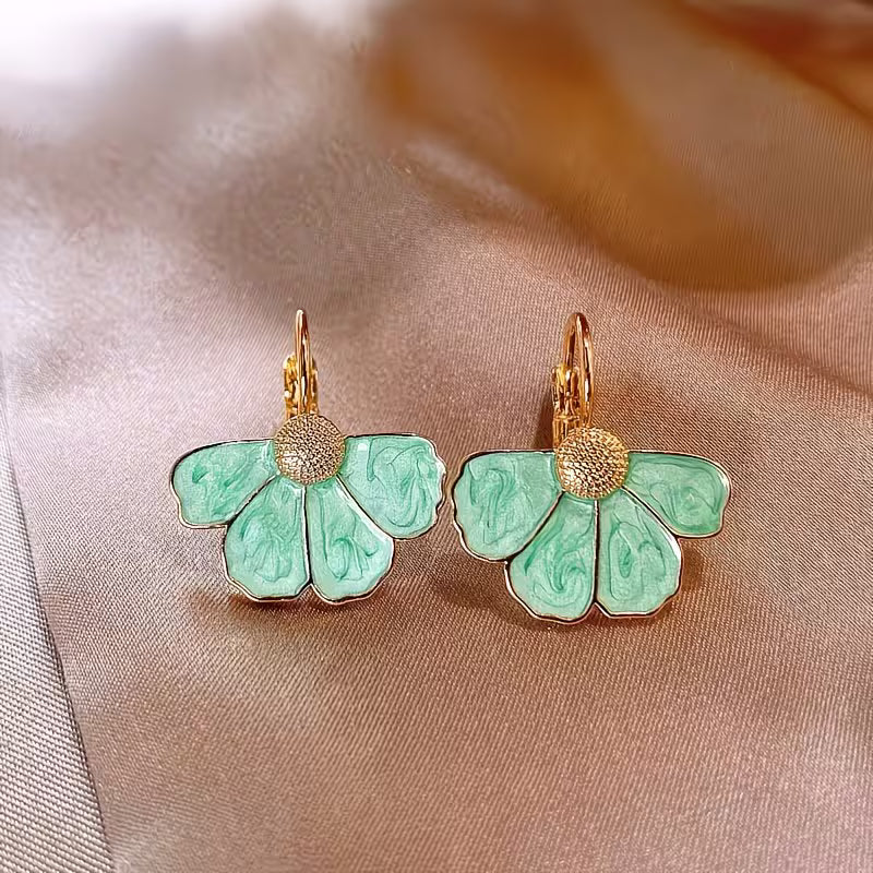Elegante Franse oorhangers met vierbladige bloem