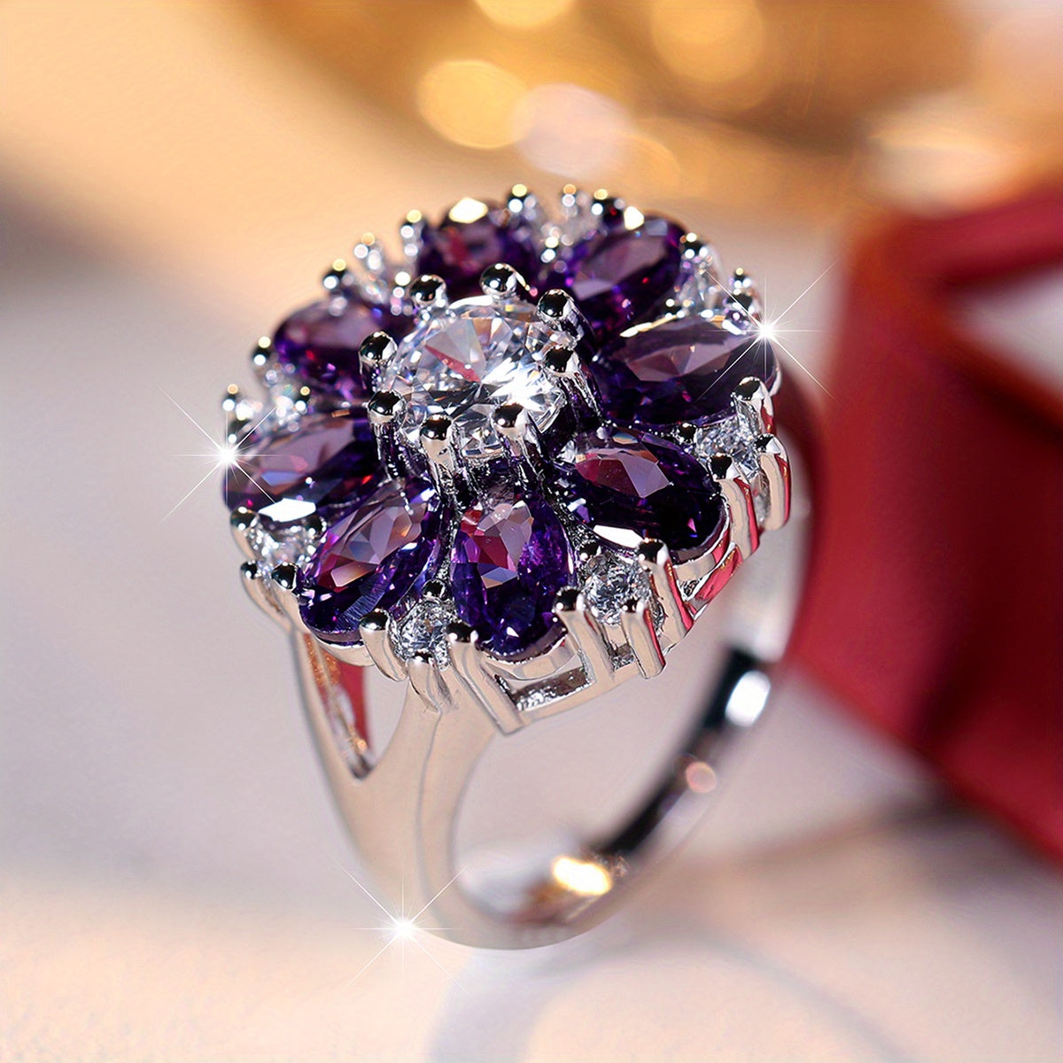 Elegante stijlvolle bloemenring met paarse zirkonia