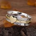 Vintage tweekleurige spinner ring met hartpatroon