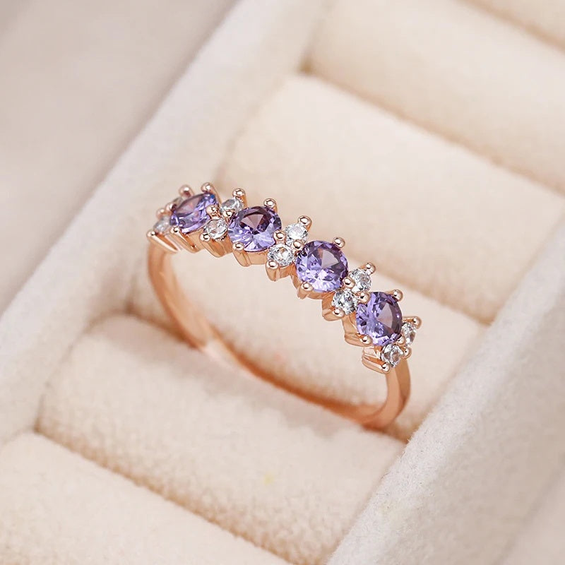 Elegante ring met paarse zirkonia en diamantaccent
