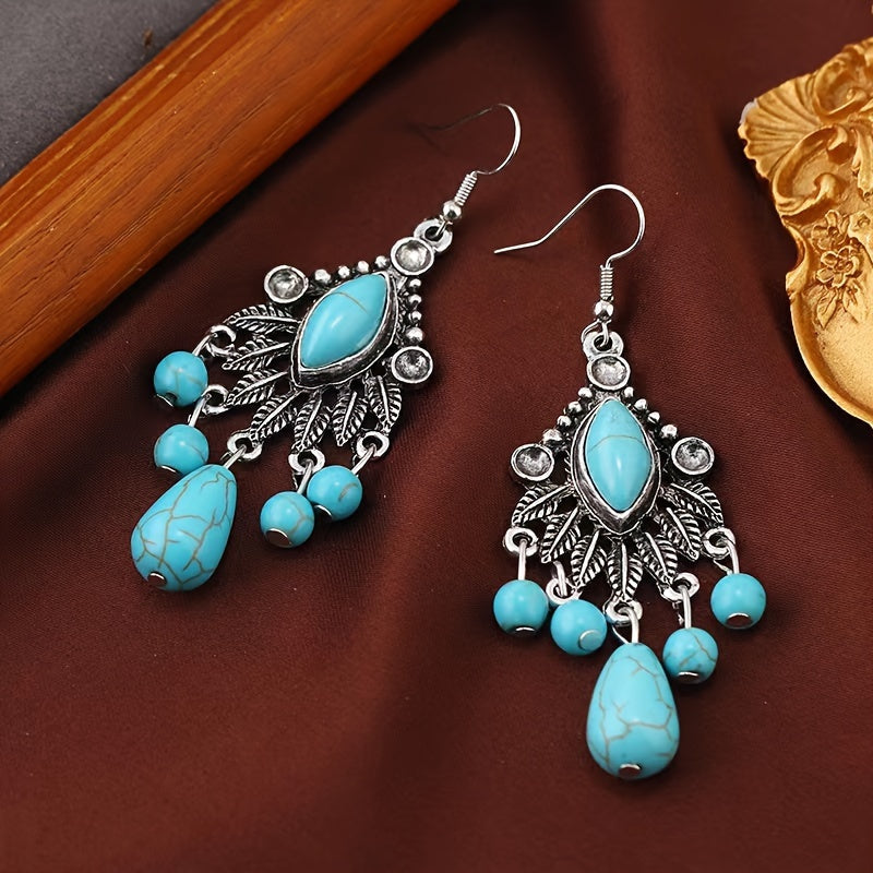 Elegante bohemien oorhangers met turkoois en transparante steen