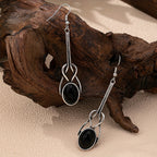 Vintage ambachtelijke oorhangers met rond glas en zinklegering
