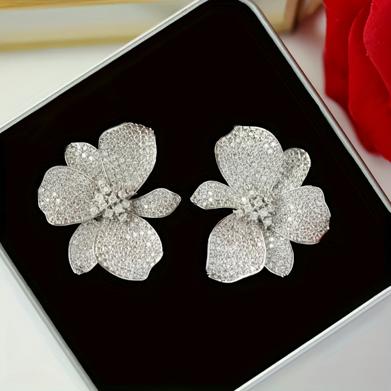 Elegant sprankelend bloem oorknopje met zirkonia