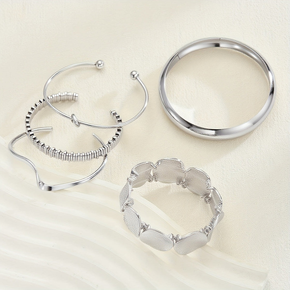 Vintage stapelbare verzilverde set slavenarmbanden