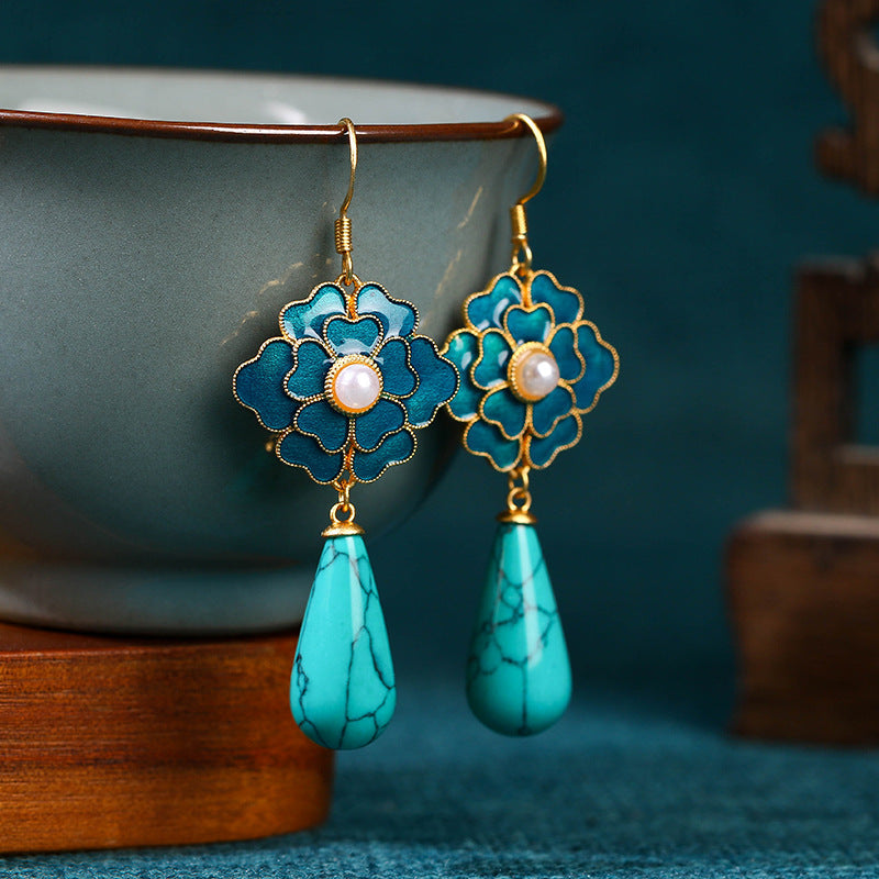 Elegante vintage oorhangers met turkoois bloemmotief en parel