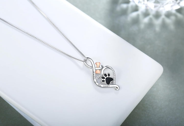Lucky Paw necklace with heart, bone and infinity symbol
