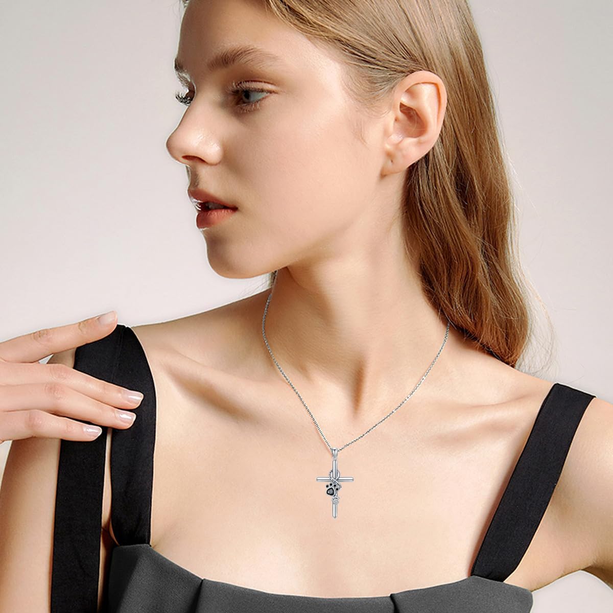 Zilveren ketting met pootje- en kruishanger