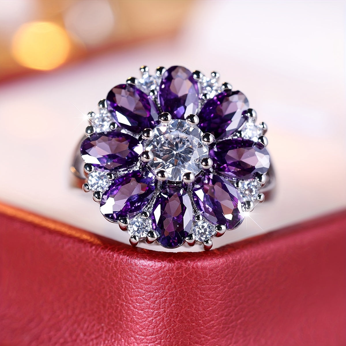 Elegante stijlvolle bloemenring met paarse zirkonia