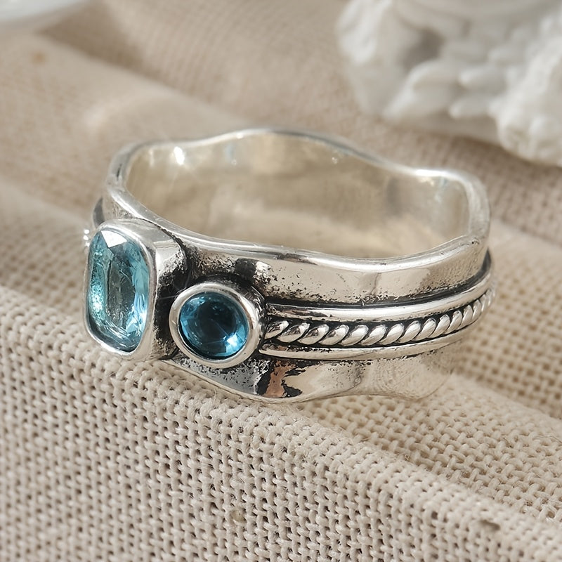 Minimalistische geometrische blauwe zirkonia ring met retro design