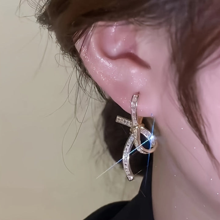 Elegant Baguette Diamond Ribbon Drop Earrings