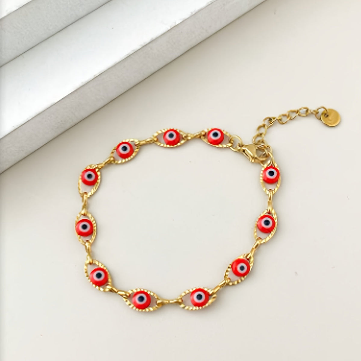 Minimalistische vergulde tennisarmband met boze oog