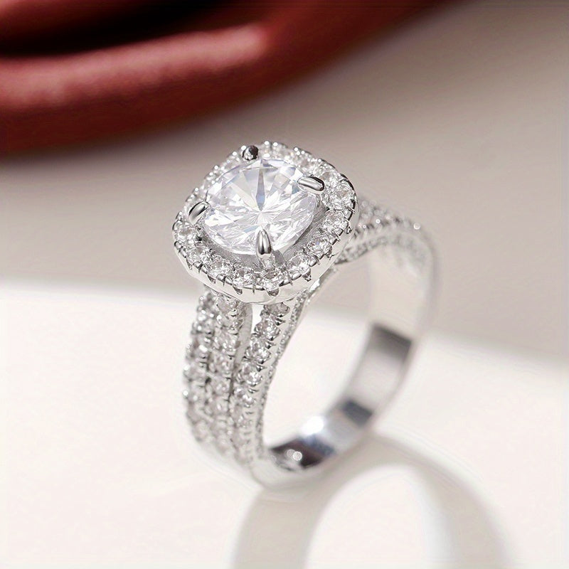 Elegante ringen met enkele zirkonia steen en micro pavé zijkant
