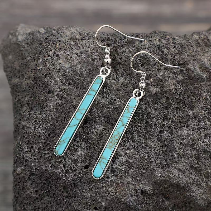 Elegante antiek verzilverde oorhangers met turkoois geometrisch patroon