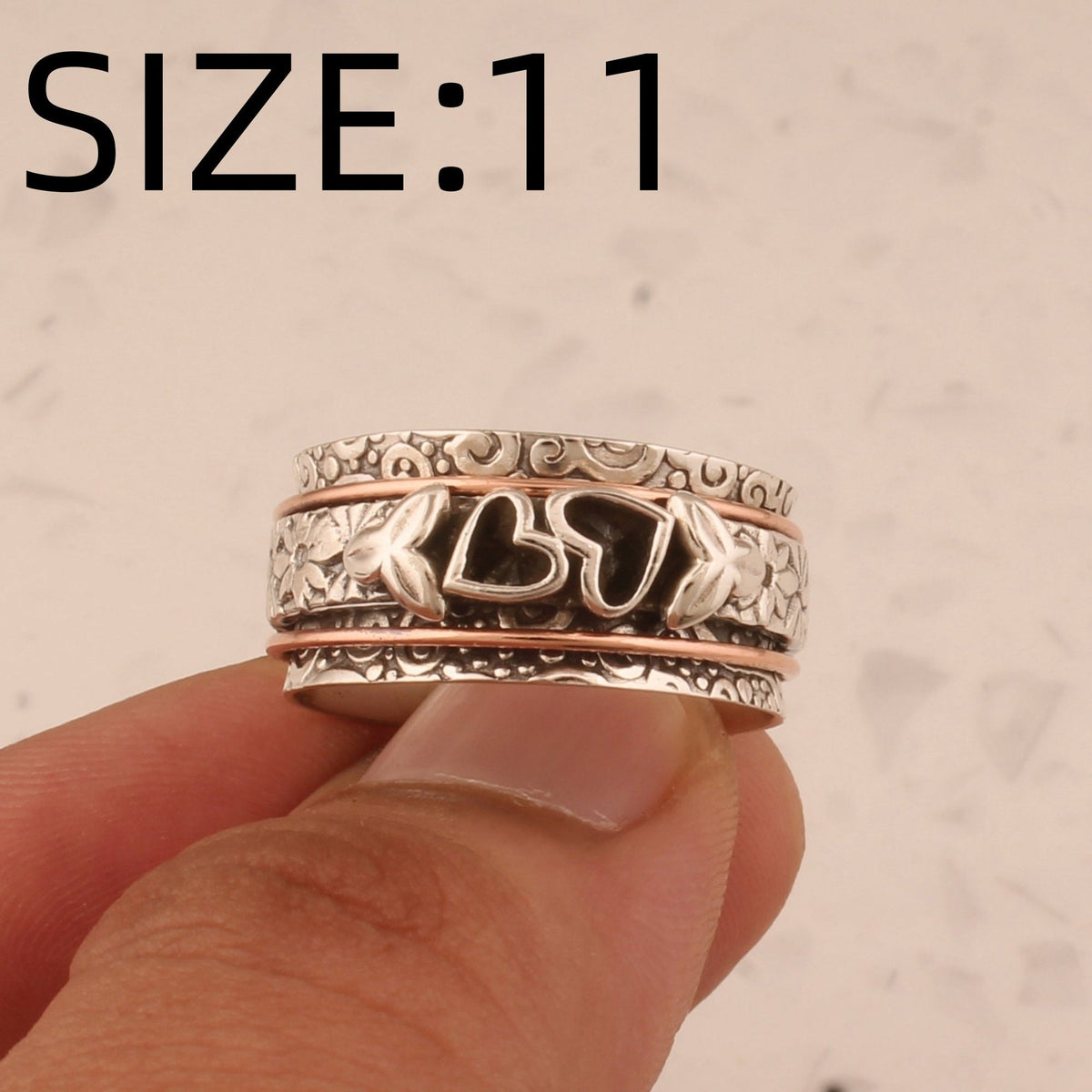 Vintage verzilverde spinner ring met vlinder en hart