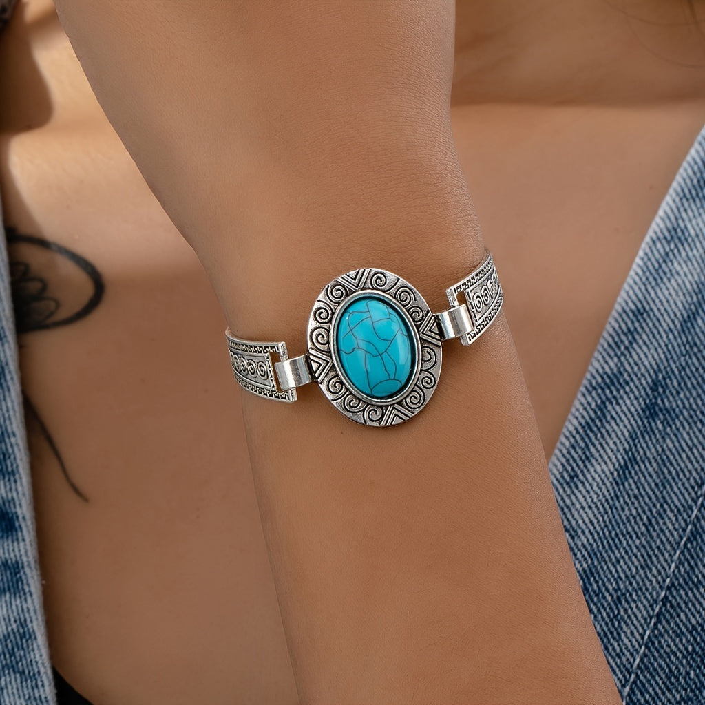 Vintage zilverkleurige armband met turkooizen accent
